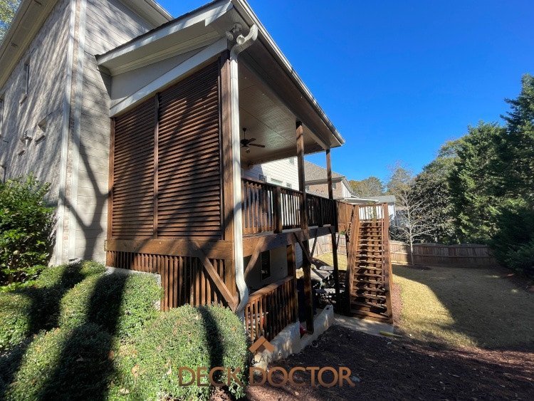 Deck Staining & Sealing Brookhaven Georgia. Second Story Deck With Privacy Louvers on Near End, Stairs On Other End. Deck Was Stained & Sealed With TWP Cedar.