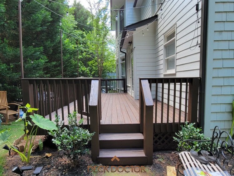 Two Tone Deck Refinishing Brookhaven Deck Floor Was Sanded To Bare Wood. Vertical Posts, Spindles Painted Medium Brown. Floor Was Oiled With TWP Butternut.